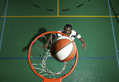 Basketball player dunking